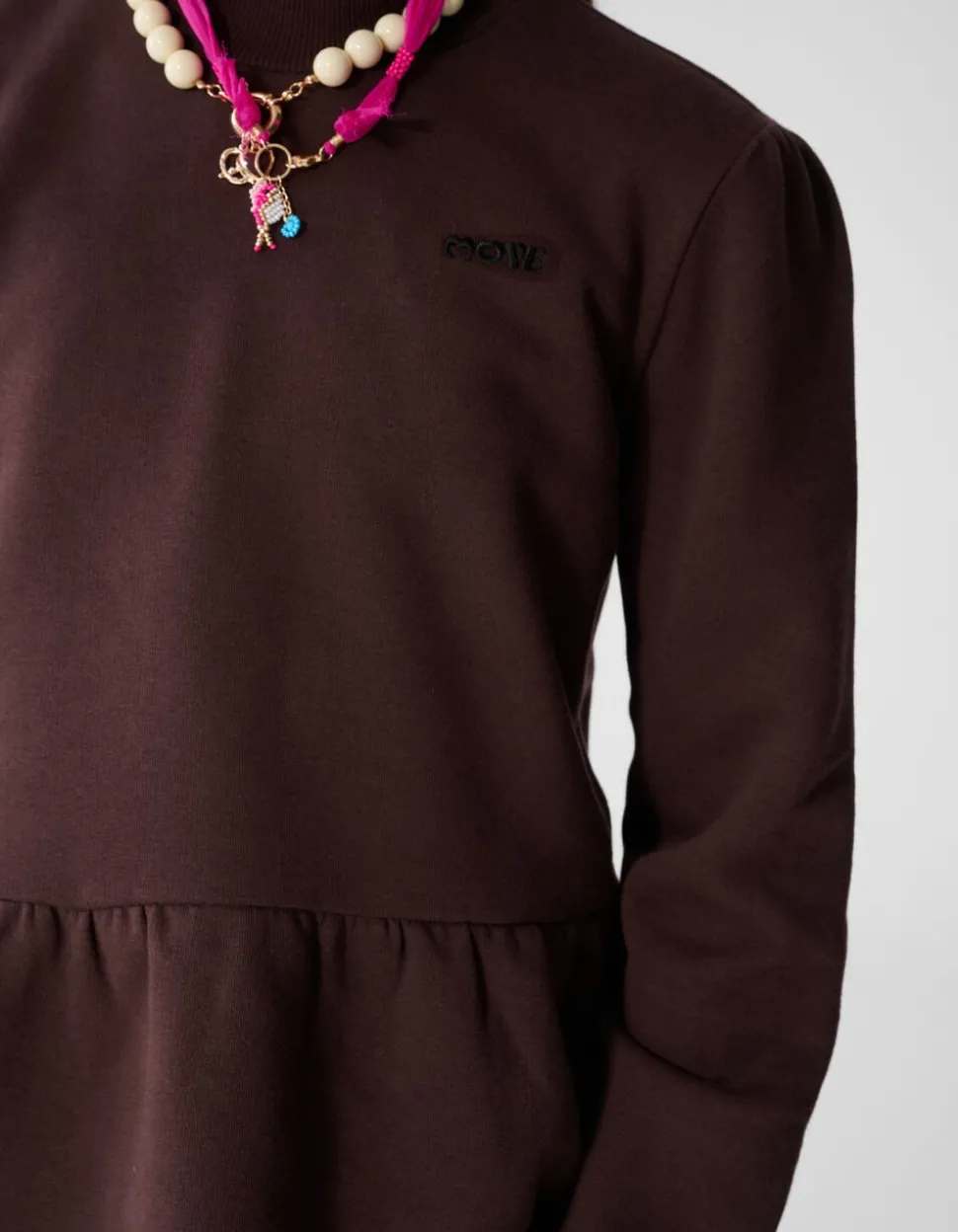 Peplum Sweater Bruin