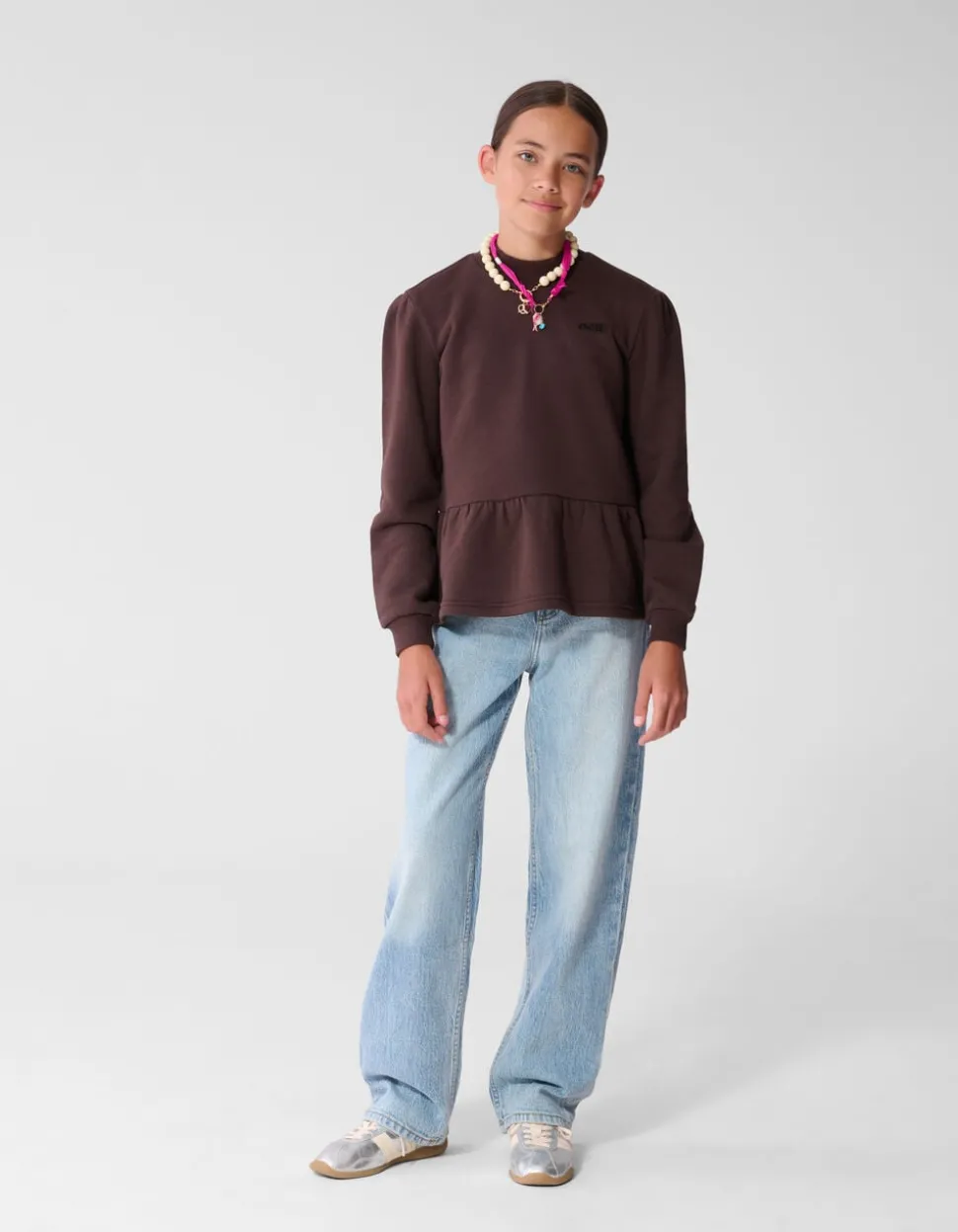 Peplum Sweater Bruin